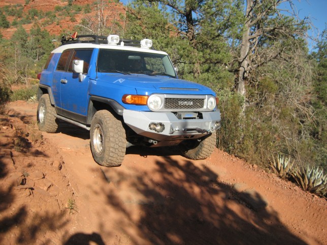 Blue Toyota 4 Wheeling