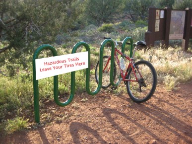 Hazardous Trails Sign on Bike Rack