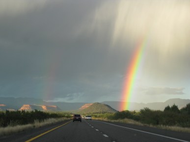 Rainbow beyond the highway