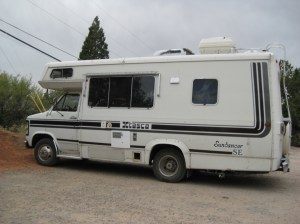 RV in the trail head parking lot