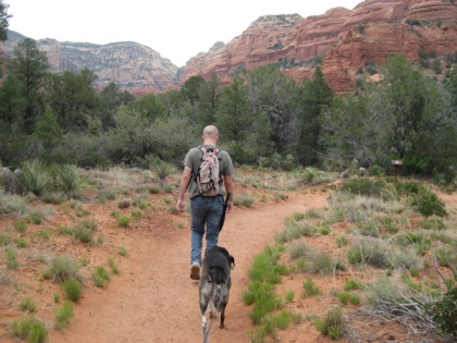 Bongo and his younger person walking on the trail