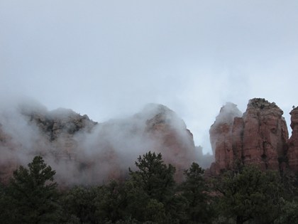 Red rocks covered in clouds