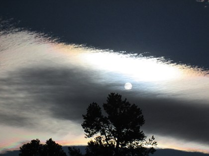 Circle of the sun showing through clouds