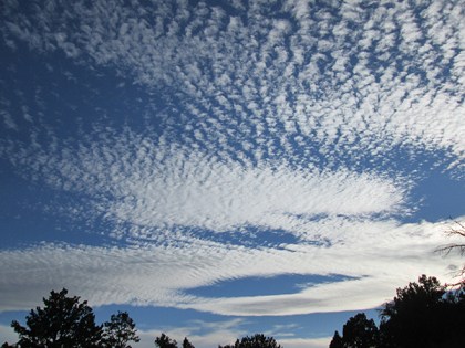 Windblown clouds