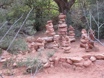Rock piles next to the trail